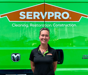 Woman in front of Servpro sign