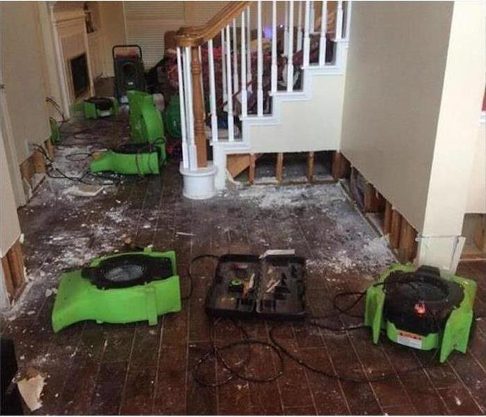 Our drying equipment working on the floor of a home that suffered water damage